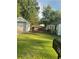Backyard view with detached garage and deck at 939 Beecher Sw Ct, Atlanta, GA 30311