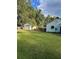 View of backyard, detached garage, and deck at 939 Beecher Sw Ct, Atlanta, GA 30311