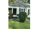 Light green house with black shutters at 939 Beecher Sw Ct, Atlanta, GA 30311