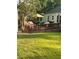 Wooden deck with patio furniture and umbrella at 939 Beecher Sw Ct, Atlanta, GA 30311