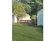 Backyard view showcasing deck and sheds at 939 Beecher Sw Ct, Atlanta, GA 30311