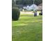 Front yard with for sale sign and manicured lawn at 939 Beecher Sw Ct, Atlanta, GA 30311