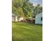 Large backyard with deck and grassy area at 939 Beecher Sw Ct, Atlanta, GA 30311