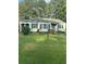 Charming ranch home with a spacious lawn and mature trees at 939 Beecher Sw Ct, Atlanta, GA 30311