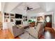 Spacious living room with fireplace, built-ins and hardwood floors at 3992 Doc Sams Rd, Cumming, GA 30028