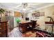 Home office with hardwood floors, built in desk, and safe at 3992 Doc Sams Rd, Cumming, GA 30028