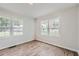 Bright bedroom with wood-look floors and ample natural light at 2666 Blount St, Atlanta, GA 30344