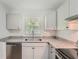 Modern kitchen with stainless steel appliances and granite countertops at 2666 Blount St, Atlanta, GA 30344