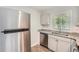 Modern kitchen with stainless steel appliances and granite countertops at 2666 Blount St, Atlanta, GA 30344