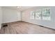 Living area with wood-look vinyl flooring and neutral walls at 2666 Blount St, Atlanta, GA 30344