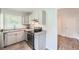 Modern kitchen with stainless steel appliances and granite countertops at 2666 Blount St, Atlanta, GA 30344