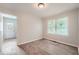 Bright bedroom with wood-look floors and access to exterior at 2666 Blount St, Atlanta, GA 30344