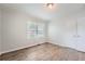 Bright bedroom with wood-look floors and window at 2666 Blount St, Atlanta, GA 30344