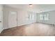 Living room with hardwood floors, neutral walls and lots of natural light at 2666 Blount St, Atlanta, GA 30344