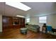 Spacious finished basement features built-in shelving and a comfortable sitting area at 37 Red Fox Trl, Euharlee, GA 30145