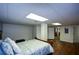 Spacious basement bedroom with a queen-sized bed and double doors at 37 Red Fox Trl, Euharlee, GA 30145