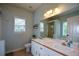 Bathroom with double vanity, large mirror, and shower at 37 Red Fox Trl, Euharlee, GA 30145