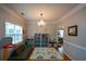 Bright playroom with built-in storage and comfortable seating at 37 Red Fox Trl, Euharlee, GA 30145