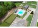 Community pool with plenty of lounge chairs and a large grassy area at 37 Red Fox Trl, Euharlee, GA 30145