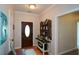 Inviting entryway with hardwood floors and storage console at 37 Red Fox Trl, Euharlee, GA 30145