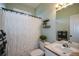 Clean bathroom with a shower/tub combo, white vanity, and updated fixtures at 37 Red Fox Trl, Euharlee, GA 30145