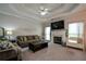 Living room with fireplace, hardwood floors and large windows at 37 Red Fox Trl, Euharlee, GA 30145