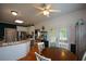 Kitchen and dining area combo with island, table, and chairs at 37 Red Fox Trl, Euharlee, GA 30145