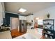 Open concept kitchen with island, stainless steel appliances, and hardwood floors at 37 Red Fox Trl, Euharlee, GA 30145