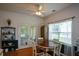 Bright dining area with round table and chairs and access to sunroom at 37 Red Fox Trl, Euharlee, GA 30145