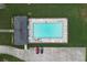 Relaxing community pool with plenty of deck space and lounge chairs at 37 Red Fox Trl, Euharlee, GA 30145