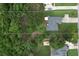 House with a large backyard surrounded by trees at 37 Red Fox Trl, Euharlee, GA 30145