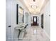 Elegant entryway with marble flooring and a large mirror at 121 Fountain Oak, Villa Rica, GA 30180