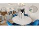 Dining area with marble table and chairs, open to the living room and kitchen at 204 Epping Street # 2, Stockbridge, GA 30281