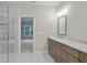 Bathroom with double vanity, marble floors and walk in shower at 2610 Lisa Sw Dr, Atlanta, GA 30311