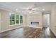 Bright living room with hardwood floors and a modern fireplace at 2610 Lisa Sw Dr, Atlanta, GA 30311