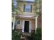 Two-story townhome with light yellow siding and brick accents at 585 Mcwilliams Se Rd # 2307, Atlanta, GA 30315