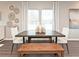 Elegant dining room featuring a wood table and modern chairs at 6374 Apalachee Se Way, Smyrna, GA 30126