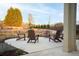 Relaxing patio seating area with fire pit and Adirondack chairs at 10 Spirea Way, Auburn, GA 30011