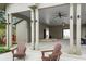 Covered outdoor space with picnic tables and a stage at 52 Spirea Way, Auburn, GA 30011