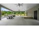 Covered outdoor space with picnic tables and a stage at 52 Spirea Way, Auburn, GA 30011