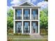 Two-story Craftsman style home with teal siding and white trim at 52 Spirea Way, Auburn, GA 30011
