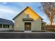 Community barn with large green doors and a metal roof at 52 Spirea Way, Auburn, GA 30011