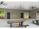 Covered outdoor space with picnic tables and a stage at 52 Spirea Way, Auburn, GA 30011