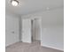 Bright bedroom with double doors to closet and bathroom at 5586 Cannonade Ln, Stonecrest, GA 30058