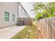 Private backyard patio with wood fence at 5586 Cannonade Ln, Stonecrest, GA 30058