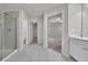 Main bathroom with double vanity, shower, and toilet at 5586 Cannonade Ln, Stonecrest, GA 30058