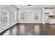 Bright dining room with hardwood floors and access to back patio at 5586 Cannonade Ln, Stonecrest, GA 30058