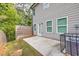 Private patio with concrete slab and wood fence at 5586 Cannonade Ln, Stonecrest, GA 30058