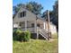 White house with front porch, grey steps, and landscaping at 2203 Hillcrest Ave, Decatur, GA 30032