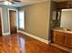 Bedroom with hardwood floors and built-in vanity at 2203 Hillcrest Ave, Decatur, GA 30032